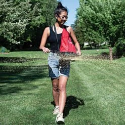 Earthway Hand Crank Spreader With 25lb Nylon Bag Hopper -A.M. Leonard Tools Shop e27 inuse vert